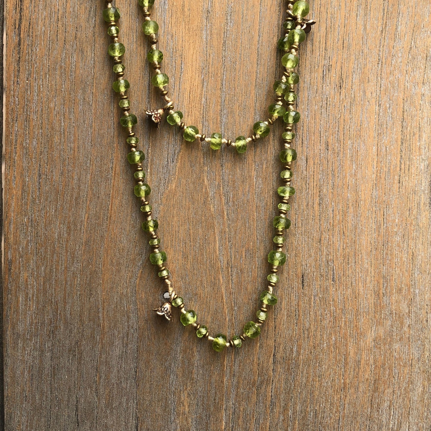 Faceted Peridot On Silk Cord Necklace