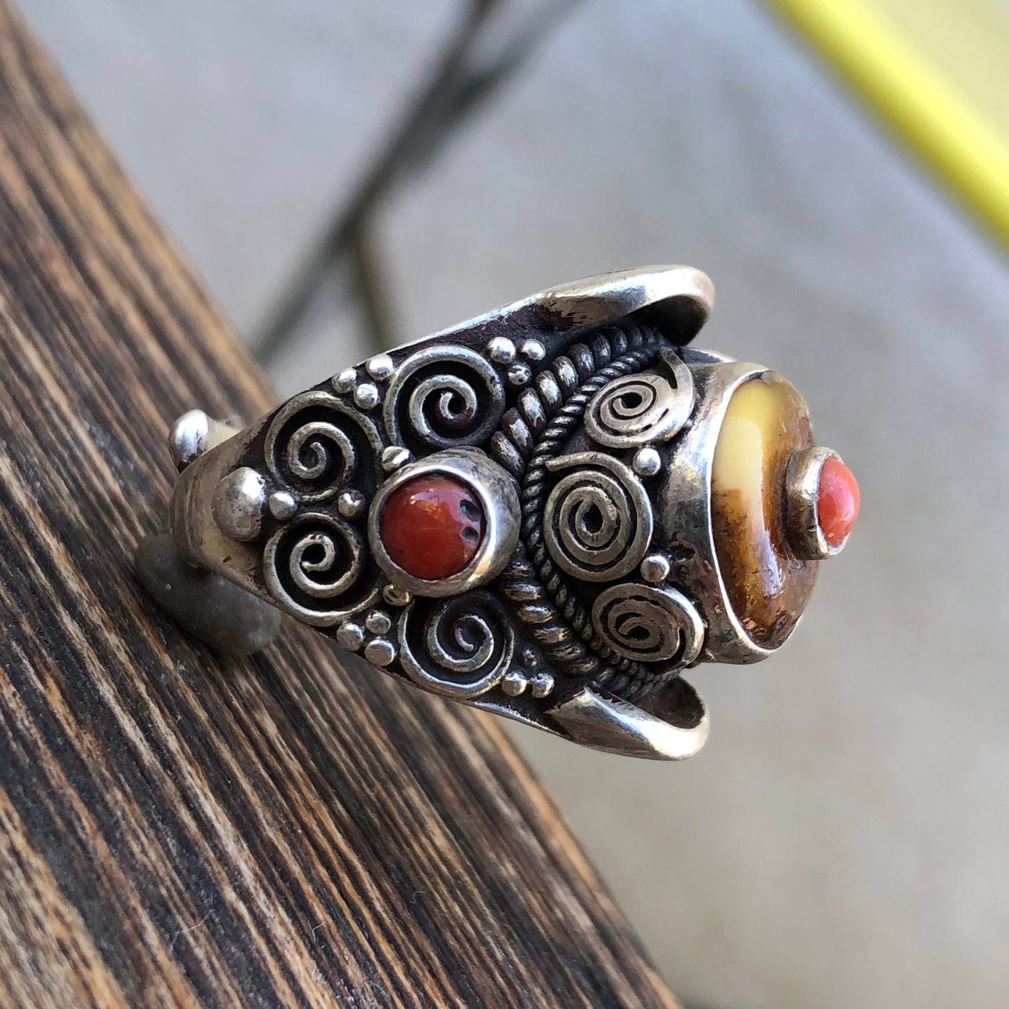 coral and amber tibetan saddle ring
