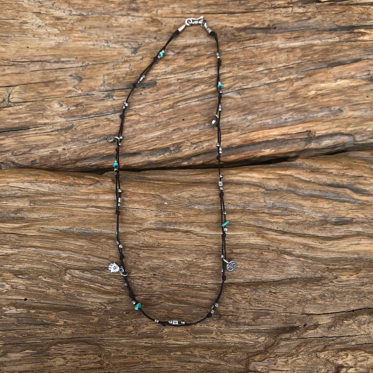 Turquoise And Tiny Silver Charm Necklace