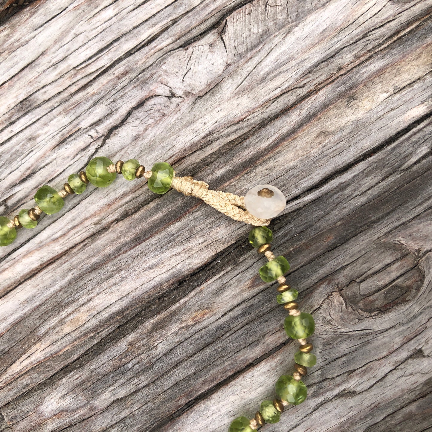 Faceted Peridot On Silk Cord Necklace