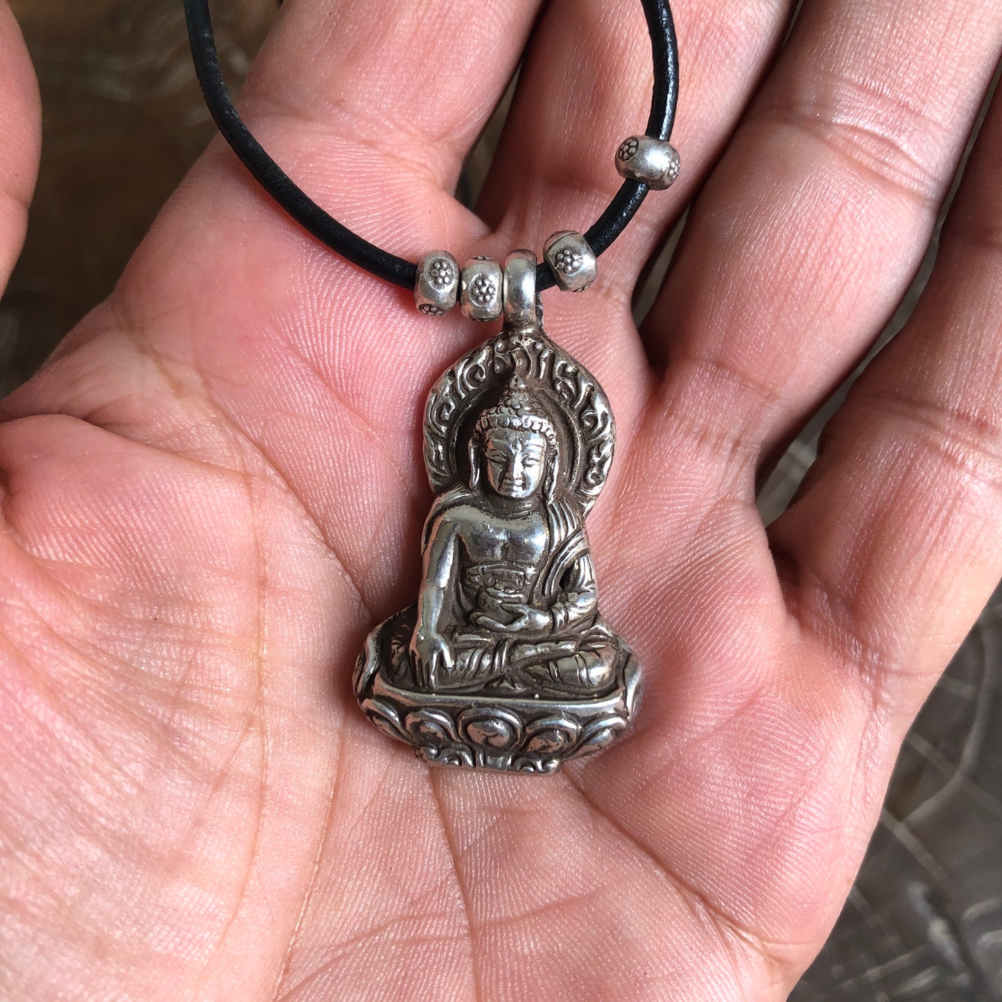 Silver Buddha pendant On Black Adjustable Leather Cord