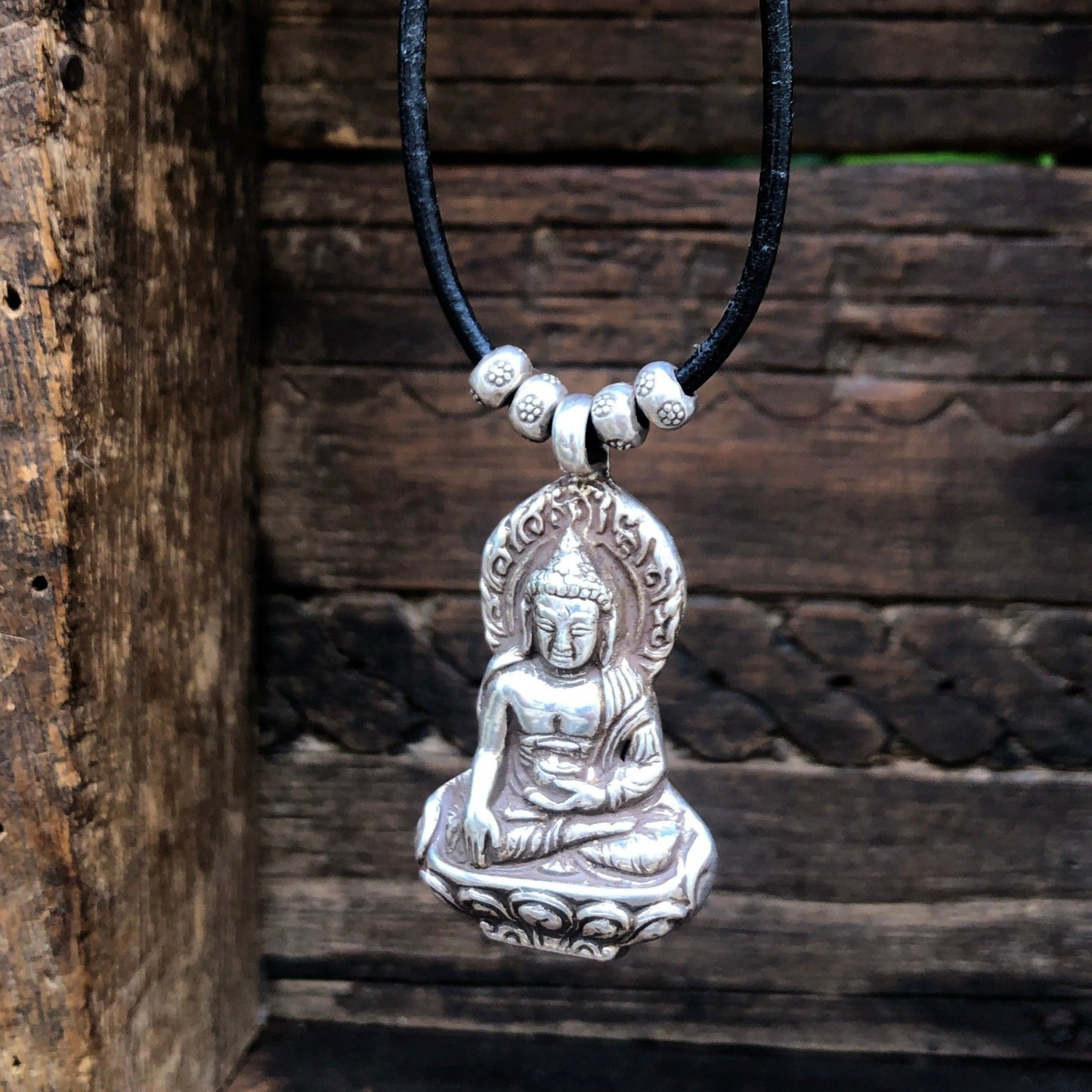 Silver Buddha pendant On Black Adjustable Leather Cord