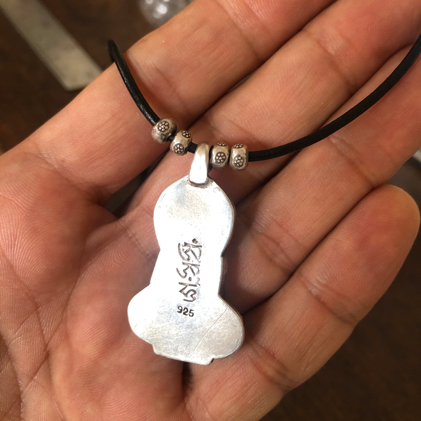 Silver Buddha pendant On Black Adjustable Leather Cord