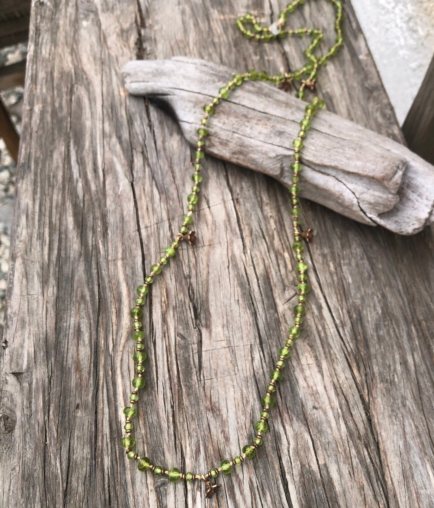 Faceted Peridot On Silk Cord Necklace