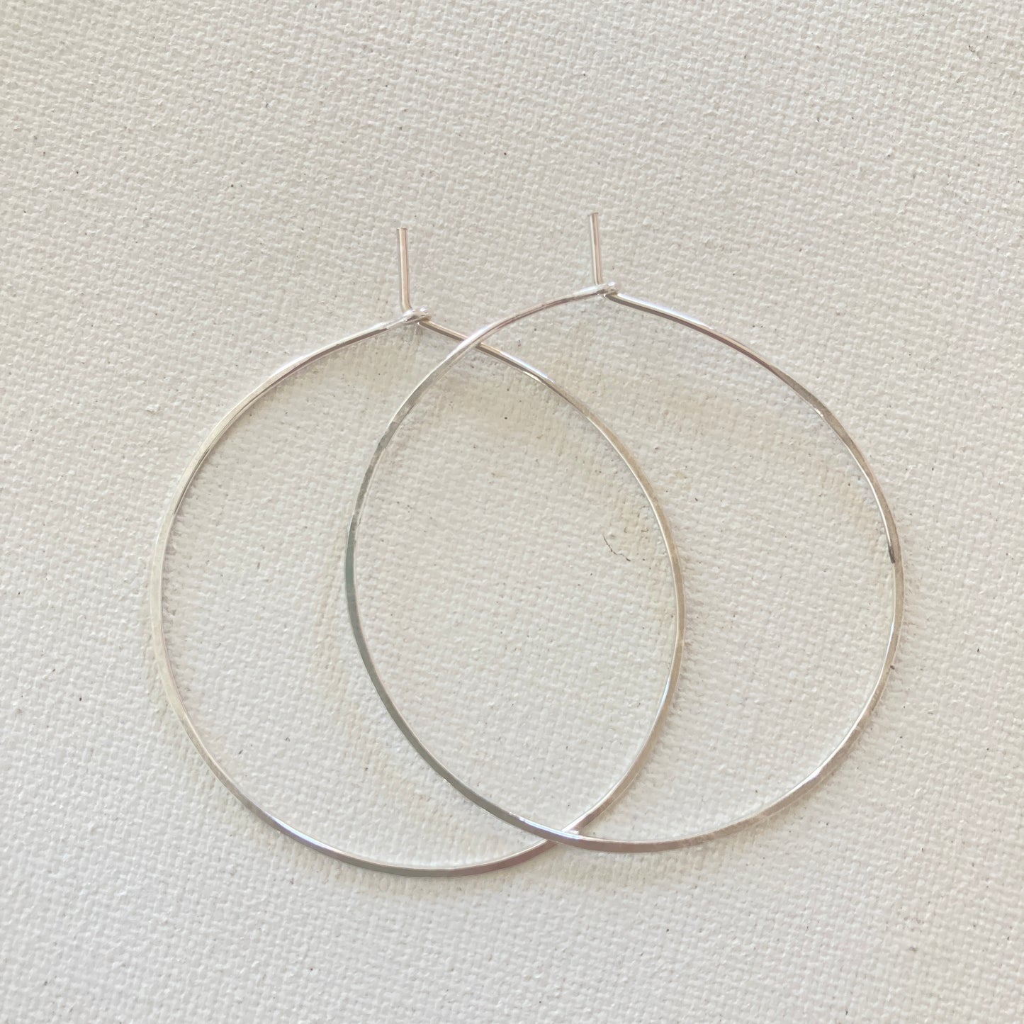 Simple sterling silver hammered hoops
