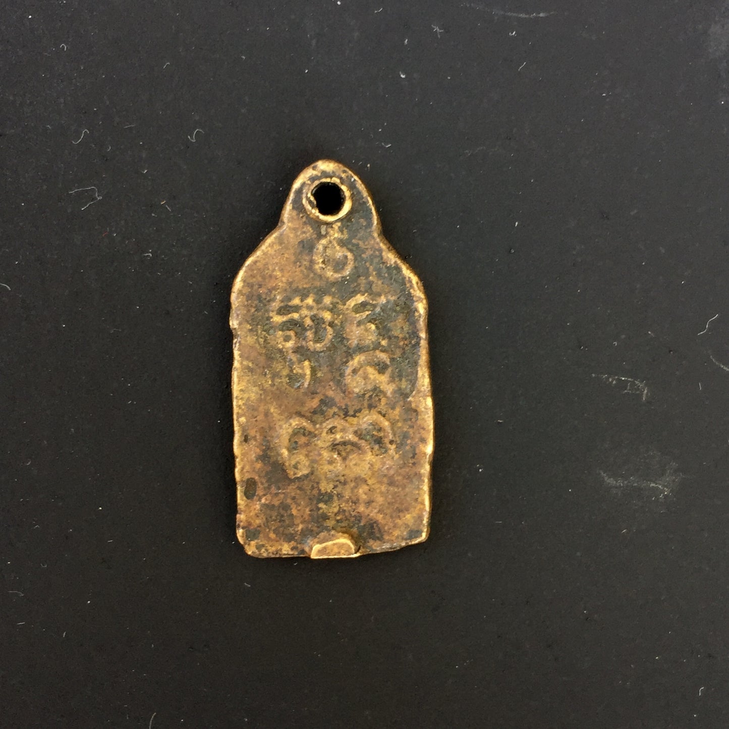 A Buddha Amulet
