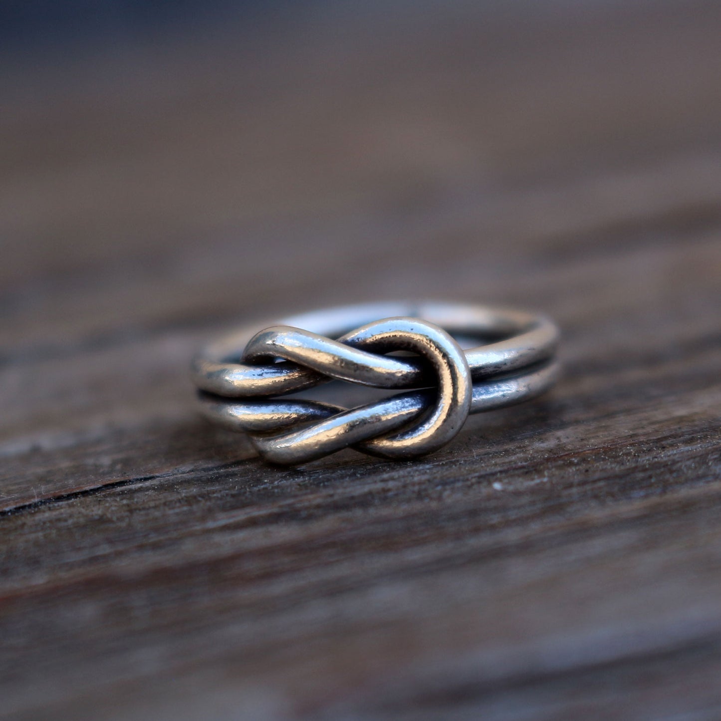 Double knotted silver ring