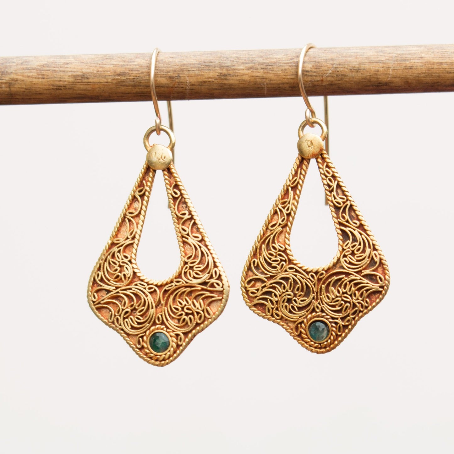 emerald dangle earrings