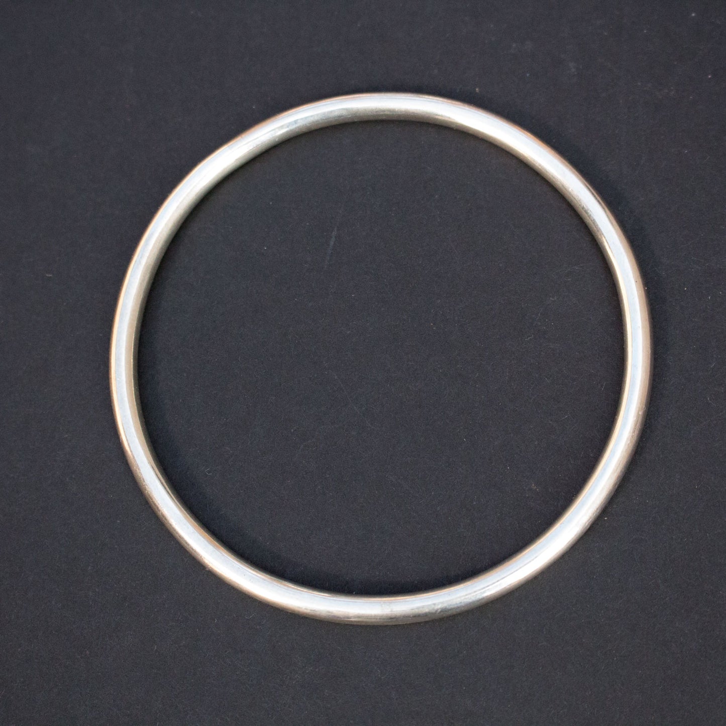 Simple silver bangle