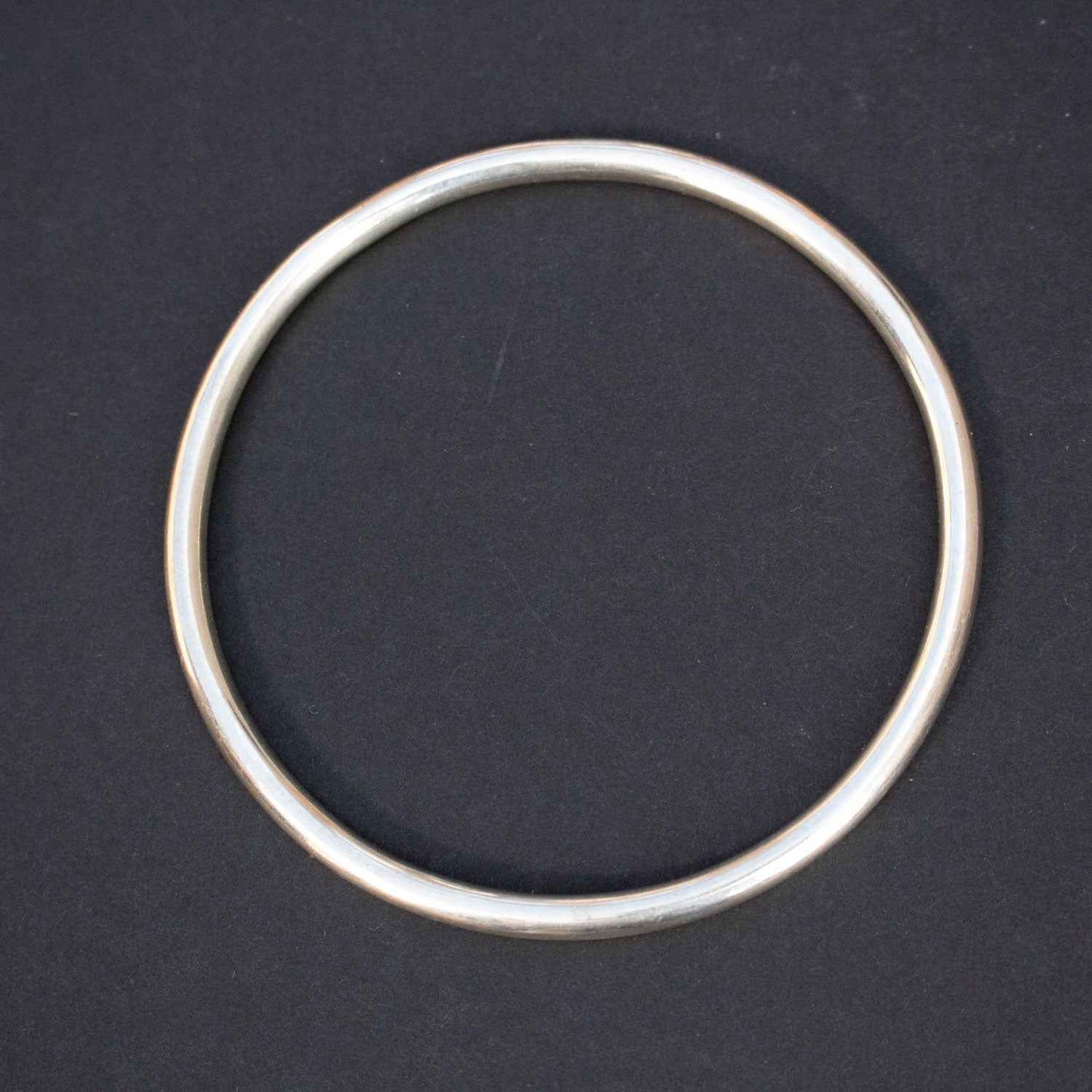 Simple silver bangle