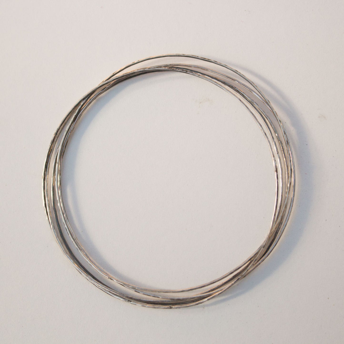 Thin Hammered Silver Bangle Set