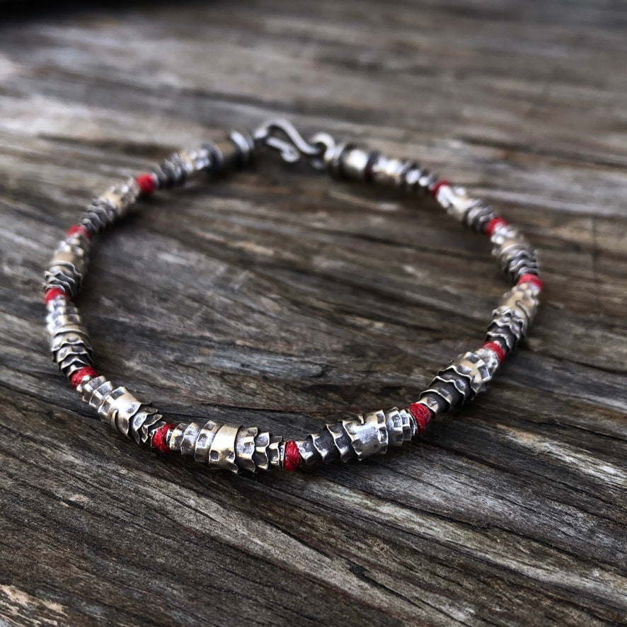 Knotted Silver Bead On Red Cord Bracelet