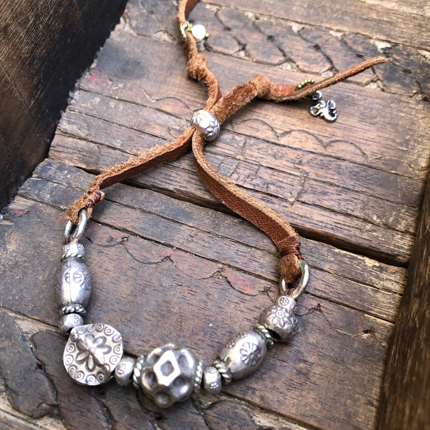 Hilltribe Silver Beads And Charms On Tan Leather