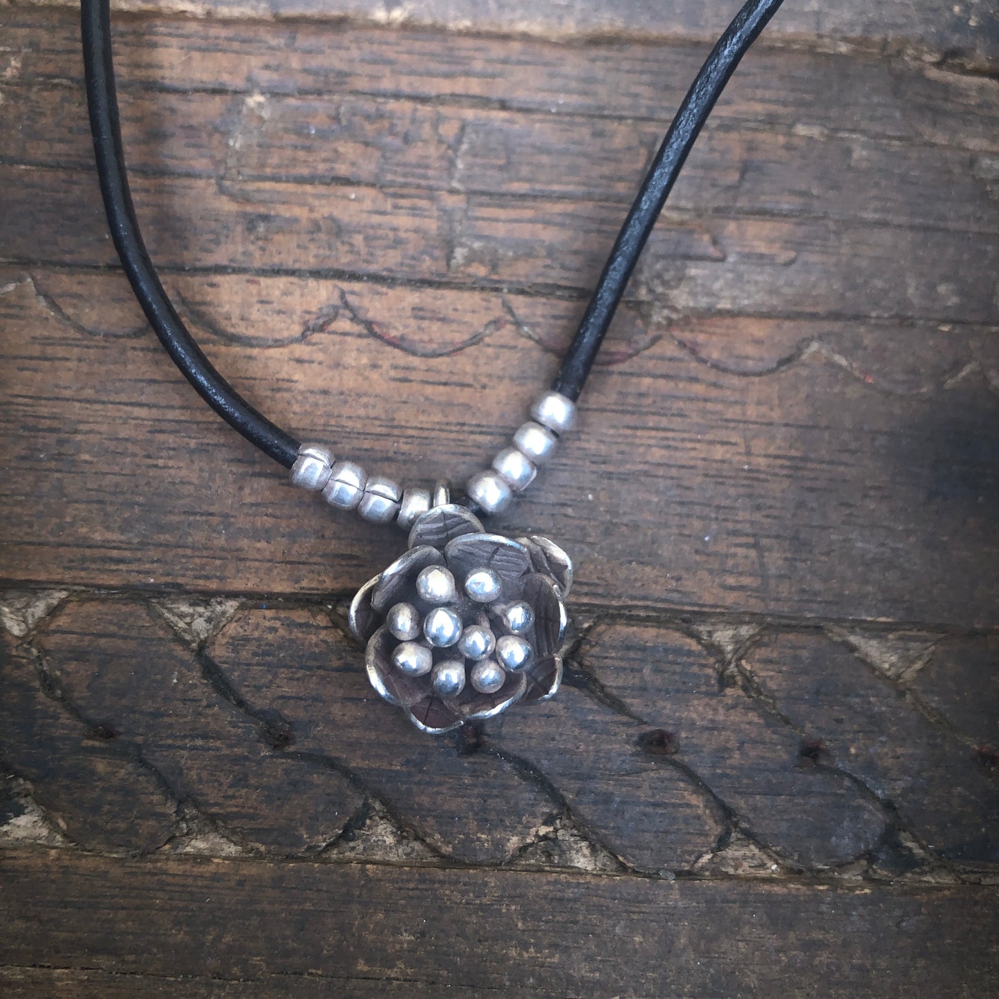 Silver Lotus Bud On Black Leather Cord Necklace