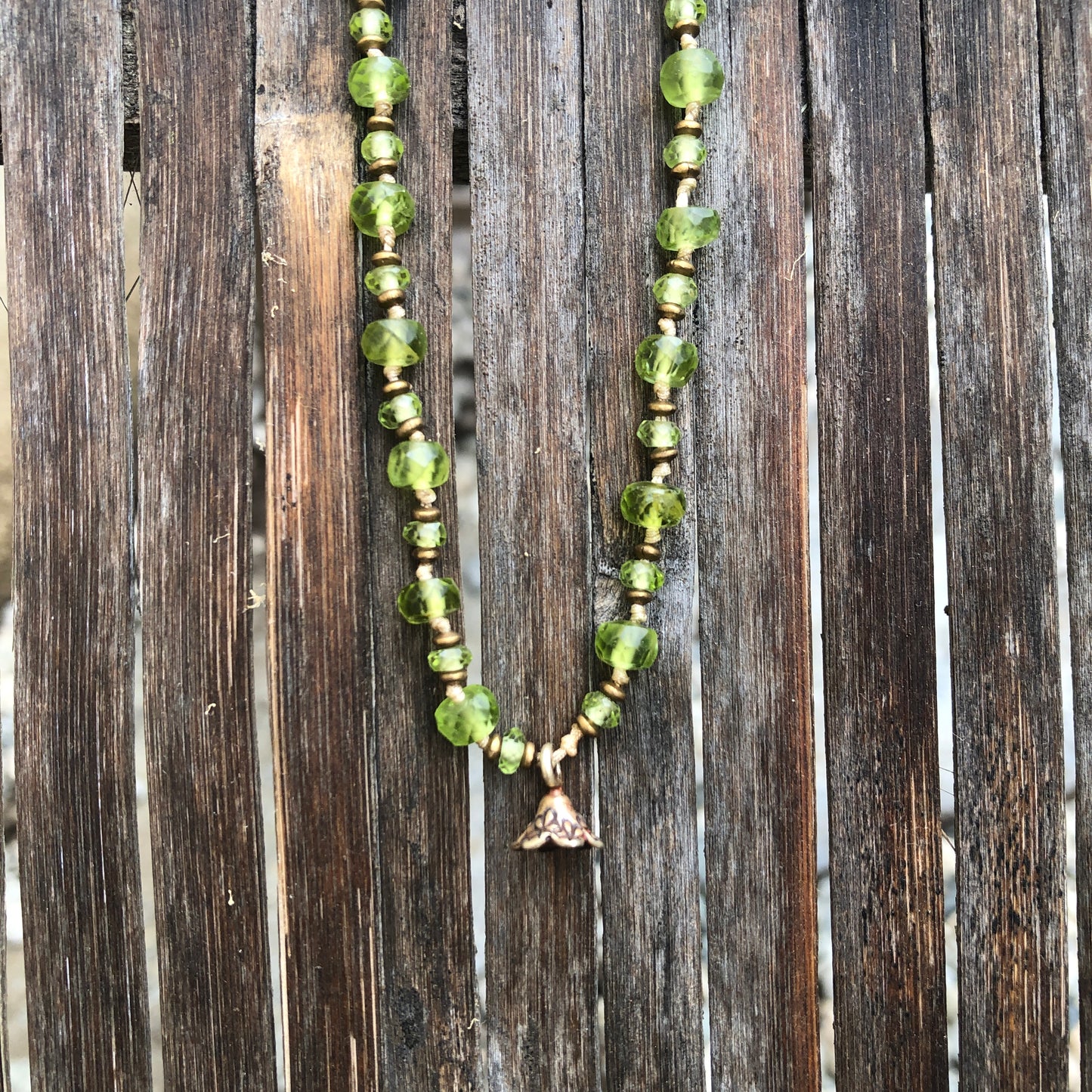 Faceted Peridot On Silk Cord Necklace