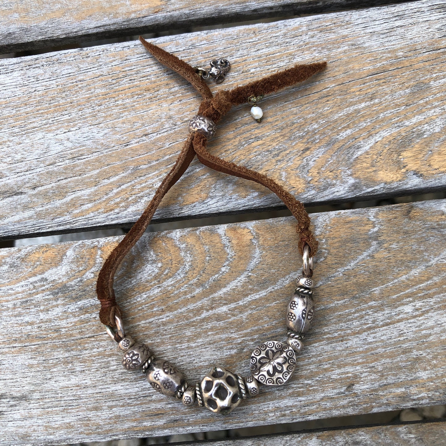 Hilltribe Silver Beads And Charms On Tan Leather