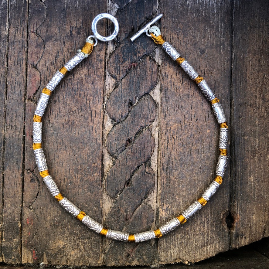 Hilltribe Silver Beads On Mustard Silk Cord