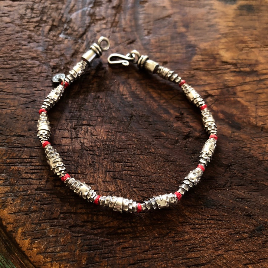 Knotted Silver Bead On Red Cord Bracelet