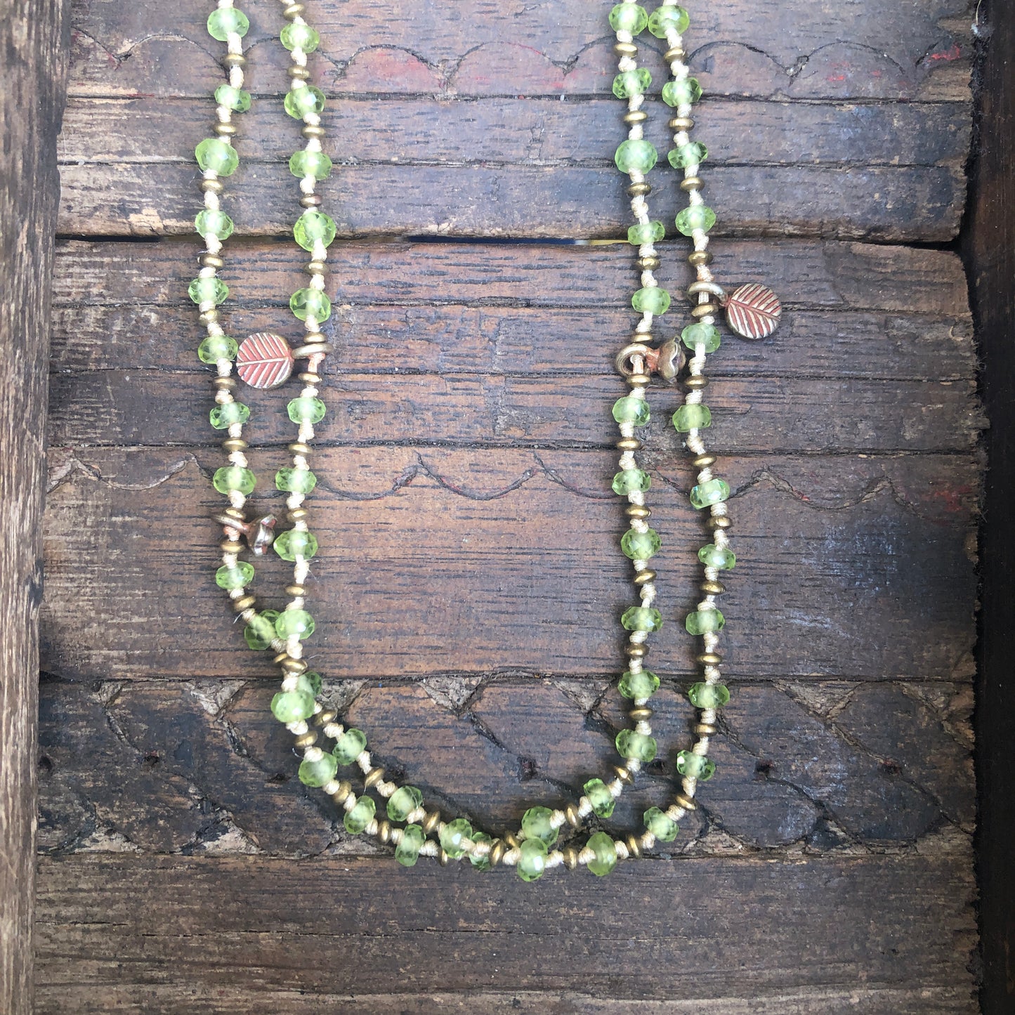 Faceted Peridot On Silk Cord Necklace