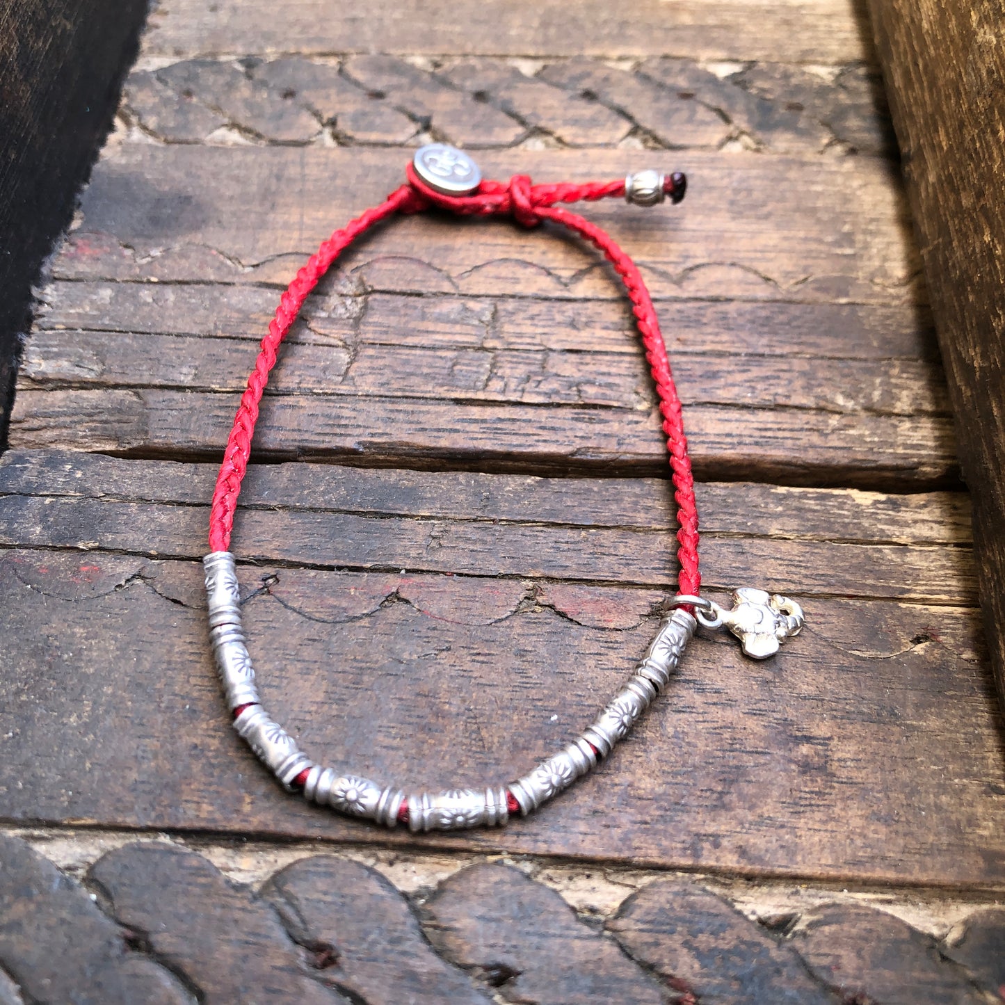 Hilltribe Silver And Charm On  Braided Red Cord Bracelet