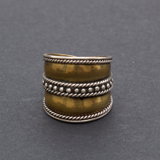Silver and brass ring