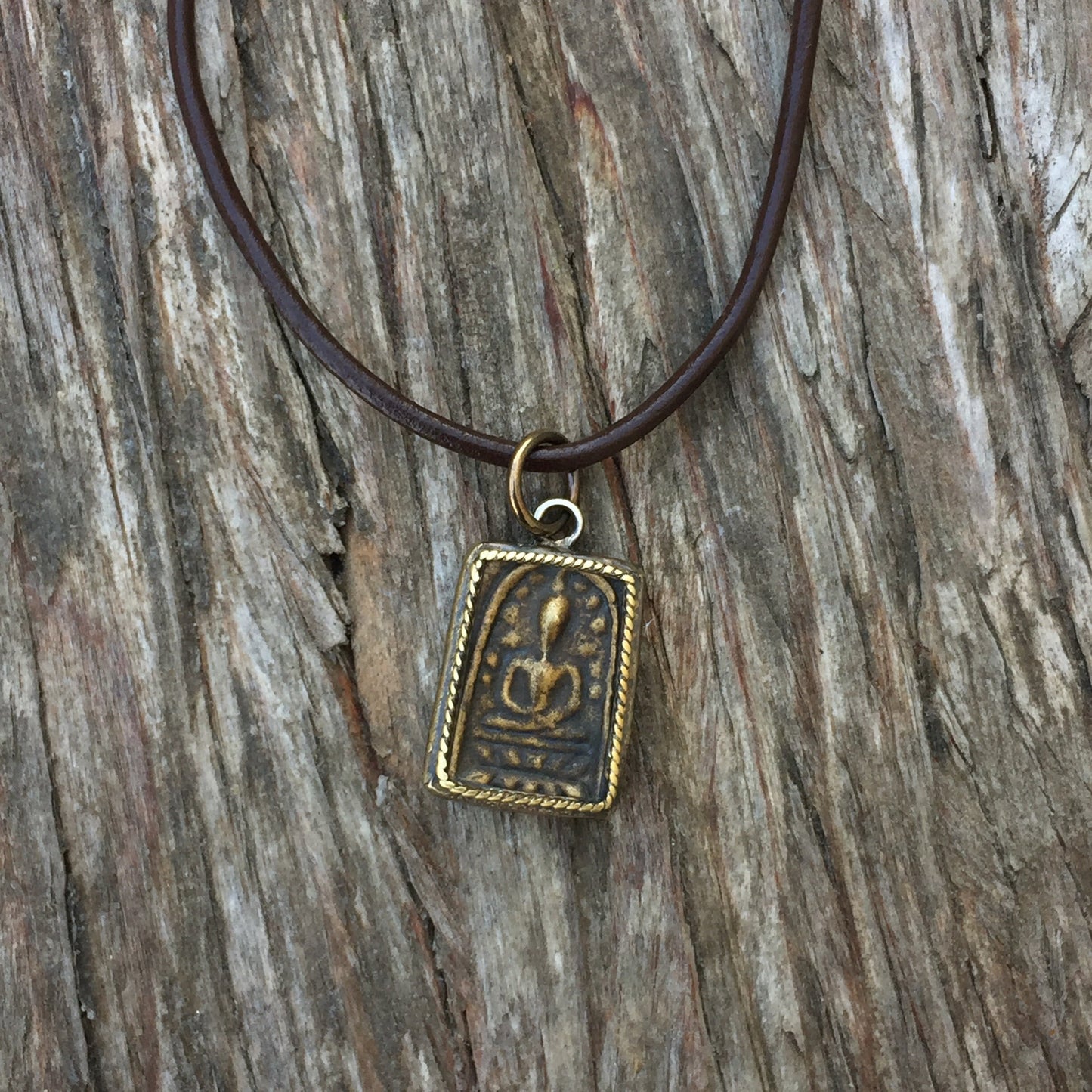 Buddha Amulet On Leather Cord