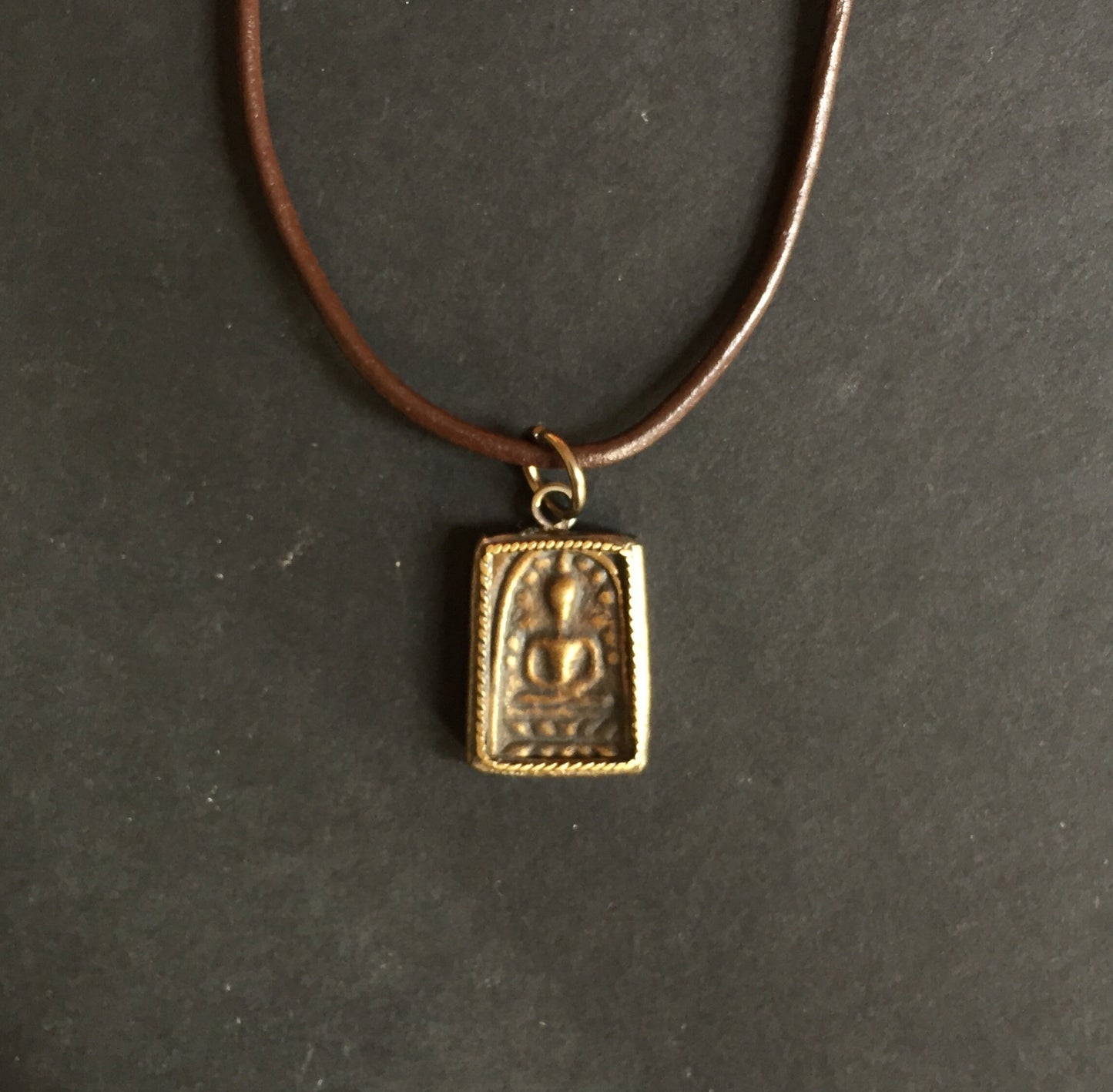 Buddha Amulet On Leather Cord