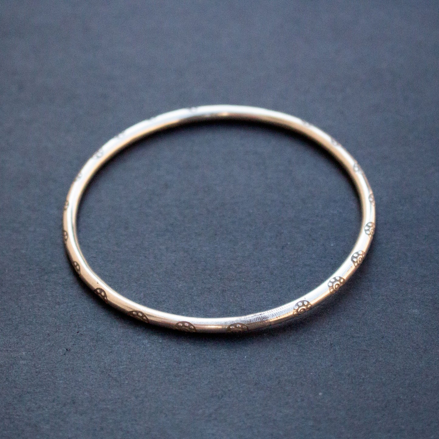 Etched sterling silver bangle